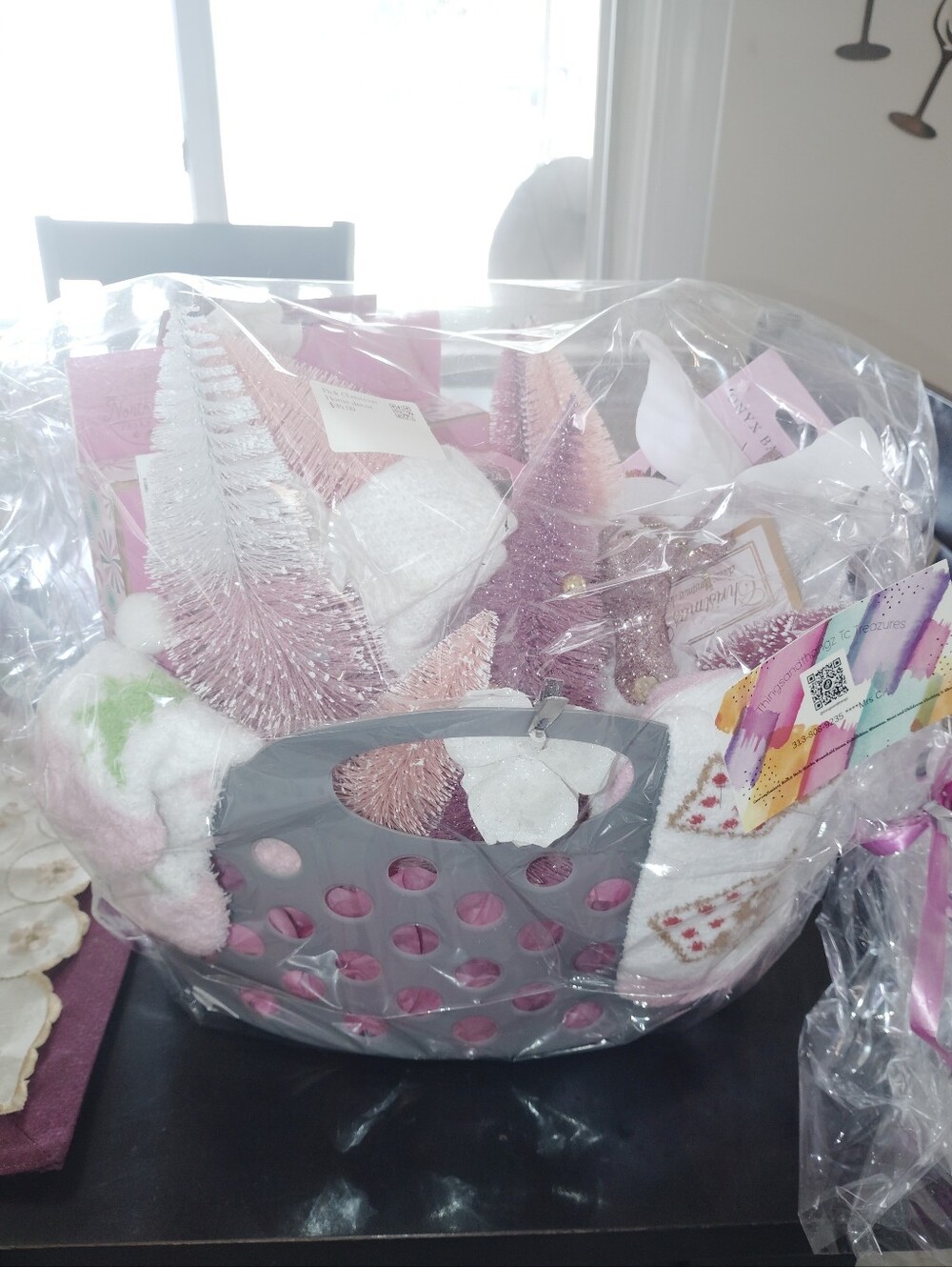 Pink Holiday Gift Basket with Decorative Trees and Accessories
